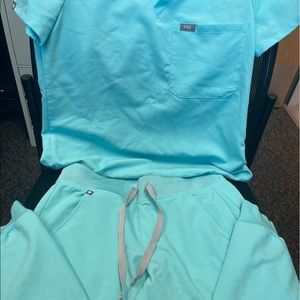 Light blue figs scrubs size XS